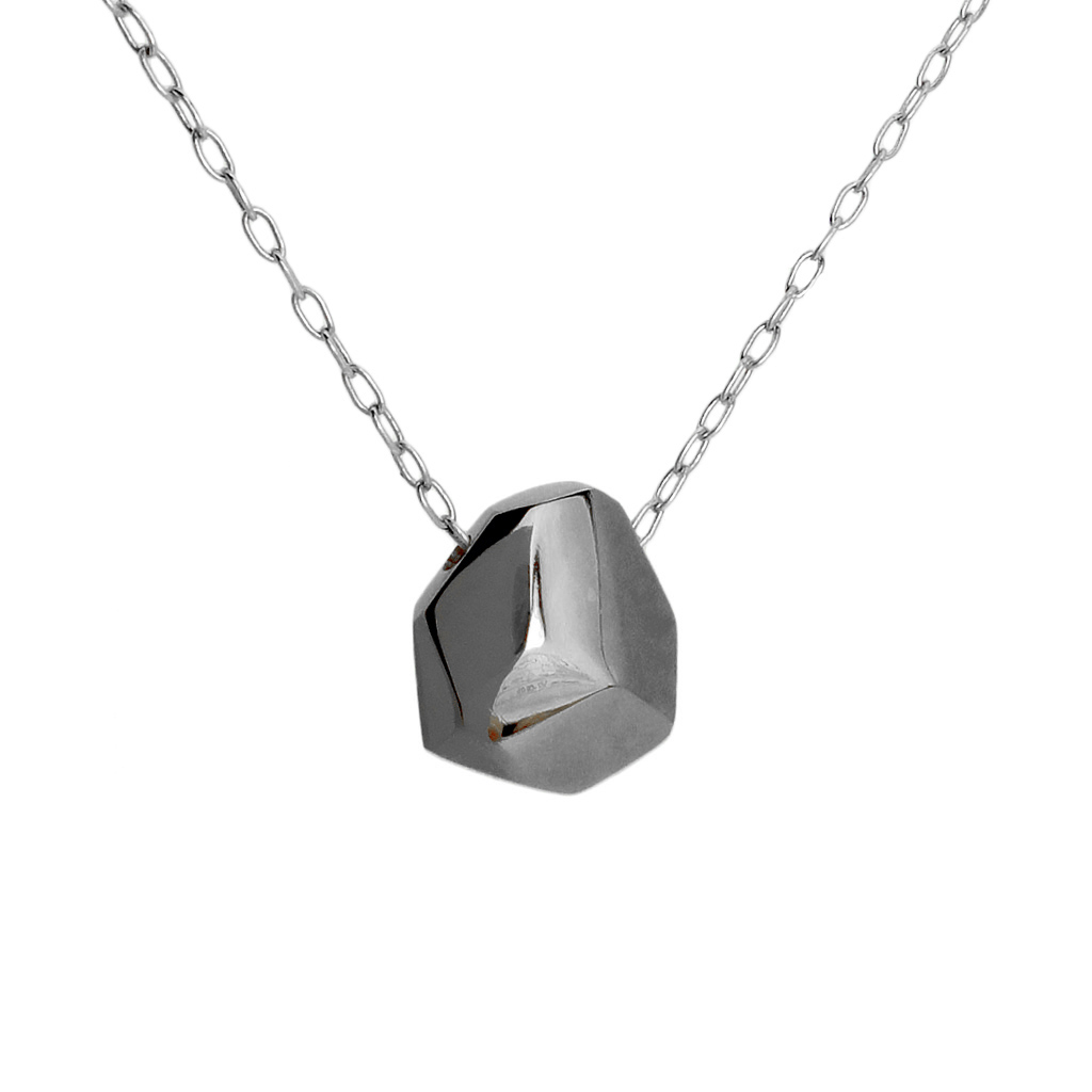 polished black asteroid shaped pendant on a silver chain, against a white background