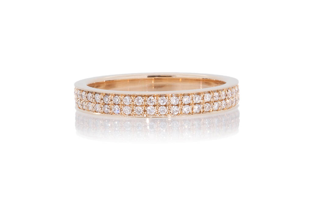 Rose gold ring set with two rows of 1.0mm diamonds on a white background
