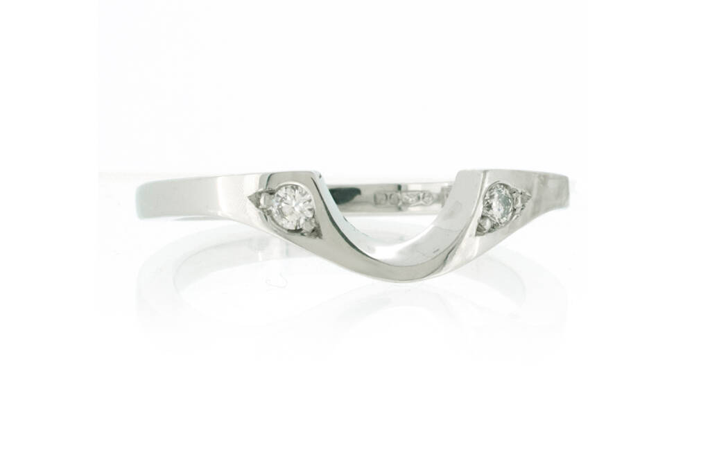 platinum wed-fit ring with ethical diamonds on white background
